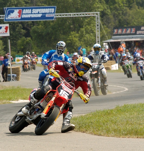 Cassidy Anderson leads Brandon Currie and the rest of the AMA Supermoto Lites field at Waterford Hills Road Race Course in Clarkson, Michigan in July of 2006. Anderson beat out Currie for the win. Waterford Hills, much too small for modern day road racing, happened to be perfectly suited for Supermoto racing. (Larry Lawrence photo)