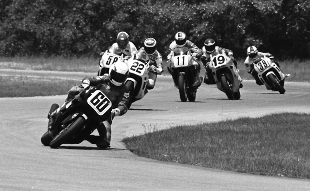Hall, Kurt - Roebling 5-88 Kurt Hall (No. 60) leads Scott Russell (No. 22), Jamie James (No. 58), Paul Bray (No. 11), Mike Smith (No. 19) and unknown rider No. 39 in a WERA C Production race at Roebling Road in May of 1988. Hall won the race on his Honda Hurricane, ending a 15-race winning streak by Scott Russell. (Larry Lawrence photo)