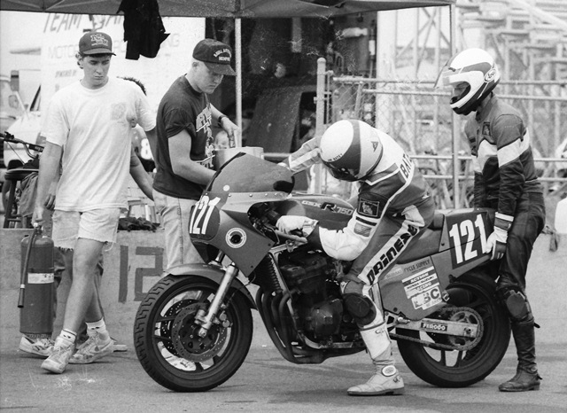 Batey, Jim - Memphis 9-89 Jim Batey dismounts from the Team Memphis Too Suzuki GSXR750 during a pit stop in the WERA/EBC Brakes National endurance race at Memphis Motorsports Park in September of 1989. (Larry Lawrence photo)