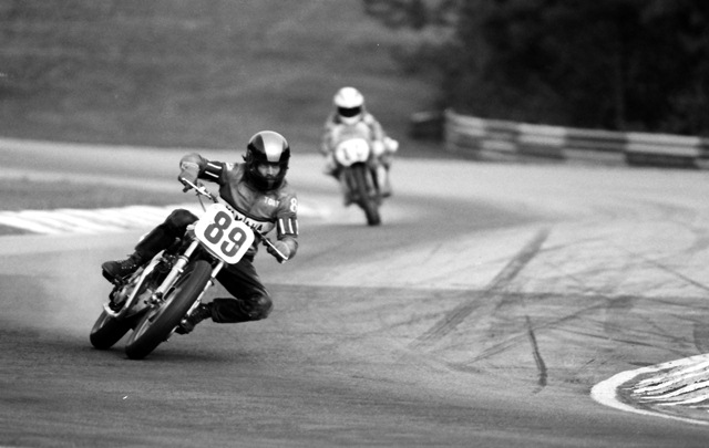 Faircloth, Tony - GNF 1986 Tony Faircloth races his vintage Triumph in the WERA Vintage 4 class at the 1986 Grand National Finals where he scored a podium finish, taking third. (Larry Lawrence photo)