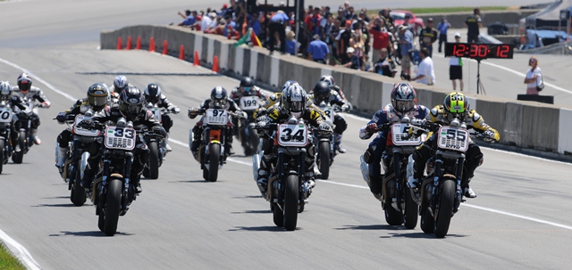 Mid-O XR1200 Chris Fillmore (No. 55) has the inside line has the AMA Pro Vance & Hines XR1200 riders blast off the line at Mid-Ohio Sports Car Course in July of 2011. (Larry Lawrence photo)