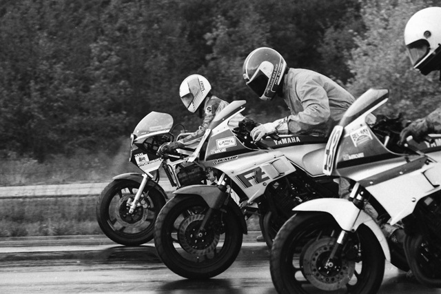 Doug Polen (far side) gets the jump on his fellow front-row starters Fritz Kling (middle) and Terry Hampton (foreground) at the start of a WERA B Production race on a rainy Grattan Raceway in October of 1986. (Larry Lawrence photo)