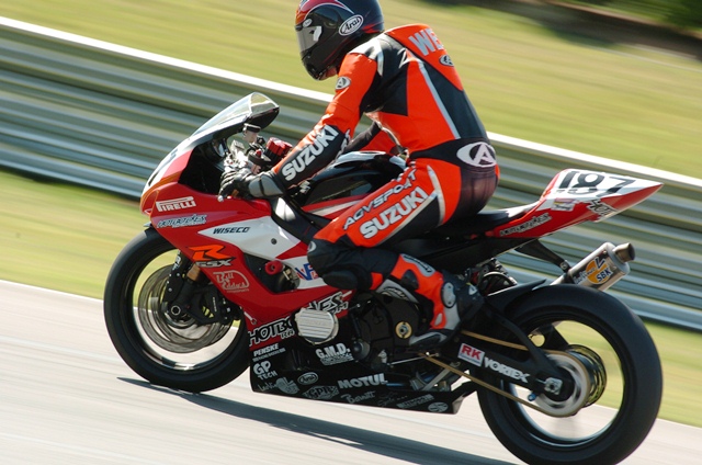 West, Cory - Barber 2005 The front suspension on the Suzuki of Cory West looks fully compressed as he brakes for a turn at Barber Motorsports Park during an AMA Superbike race in April of 2005. (Larry Lawrence photo)