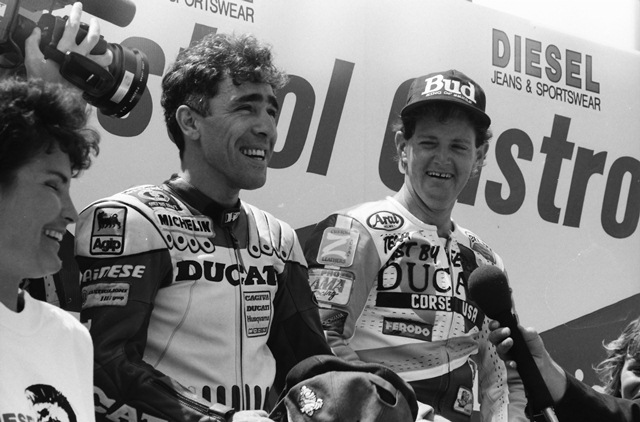 Winner Raymond Roche and surprise runner up Jamie James share a laugh on the podium at the 1990 World Superbike race at Mosport. Roche and James finished first and second in both legs of the world championship rounds in Canada. (Larry Lawrence photo)