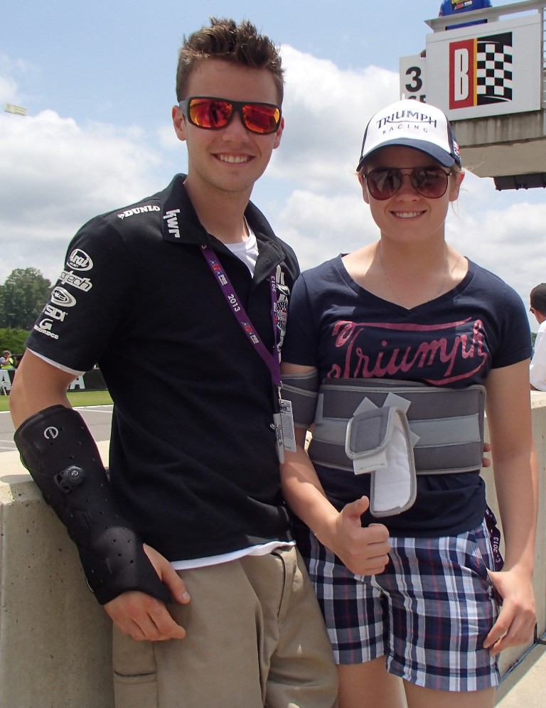 Kyle Wyman and Elena Myers show they’re doing their part to keep the orthopedic brace industry in business. (Larry Lawrence photo)
