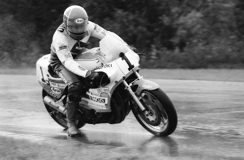 Doug Toland eases the Team Hammer Suzuki through turn one in the rain at Blackhawk Farms Raceway during a WERA National Endurance race in august of 1985. Riders reported that Blackhawk in those days in the rain was akin to racing on an ice rink. (Larry Lawrence photo)