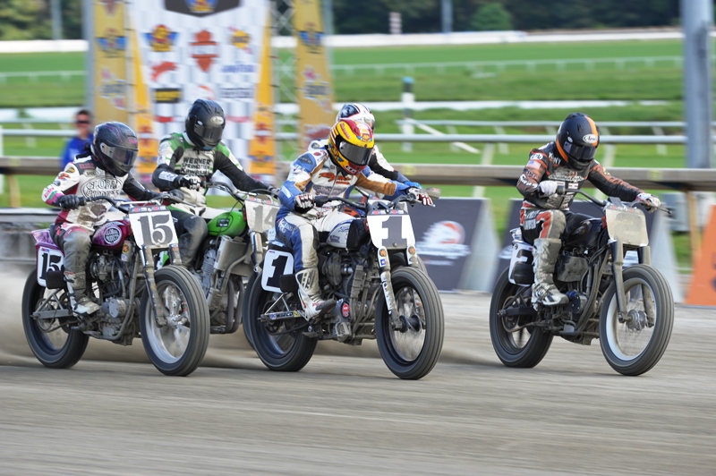Jared Mees (No. 1) and Nichole Cheza (No. 15) at the start of a Heat race at Colonial Downs last weekend. This weekend the couple is slated to marry at the Springfield Mile. (Larry Lawrence photo)