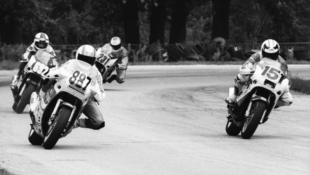 Keith Badger (No. 887) and Jim Pekowsky (No. 151) have completely different lines as they race between turns four and five at Blackhawk Farms Raceway on August 27, 1989. Pekowsky had a memorable weekend at Blackhawk that day. He won the WERA A Superbike and B Superbike novice races riding a Suzuki GSXR750 borrowed from John Eidenberger. (Larry Lawrence photo)