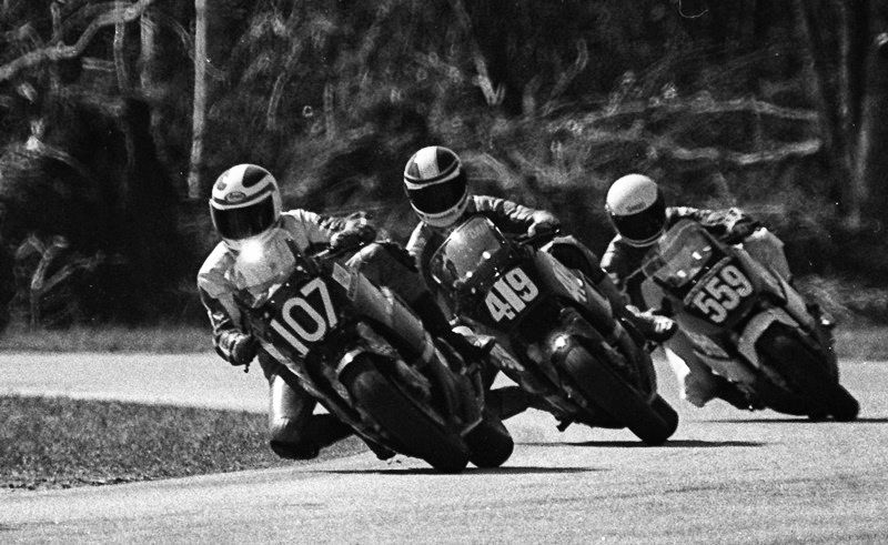 Duke Collins (No. 107) leads David Dearing (No. 419) and Paul Bray (No. 559) in a WERA C Production race at Roebling Road Raceway in February of 1986. (Larry Lawrence photo)