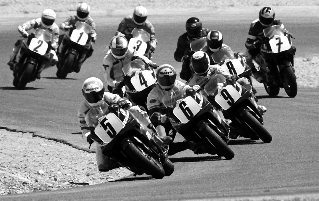 Chuck Graves leads Mike Harth, Kent Kunitsugu and the rest of the pack in a California Superbike School Challenge race at Willow Springs in April of 1990. (Larry Lawrence photo)
