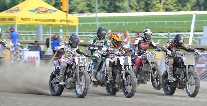 Nichole (No. 15) and Jared Mees (No. 1) blast off the start in a Heat race at Colonial Downs in Kent, Va., in August of 2013. (Larry Lawrence photo)