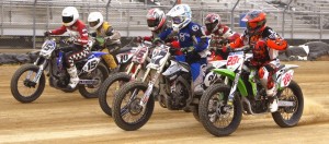Bri Hazen #15K, Kevin Wilson #45, Rob 'Bugs' Pearson #27 and Fight for Dirt Track.com's own Tyler Porter #28C blast off the line during one of Mid-America's regular season events in June 2012, all of whom are regular attendees and supporters at Mid-America Speedway. Photo by Mike 'Stu' Stuhler/Stu's Shots. 