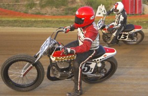 Dave Atherton #15X and David 'Bones' Aldana battle during one of the Bultaco Astro Cup heat races during a round of the AMA Vintage Dirt Track National Championship Series at Mid-America Speedway in August 2013. Mid-America Speedway will again host round 10 of the 2014 AMA Vintage Dirt Track National Championship Series on August 9 with the Bultaco Astro Cup event returning for the second season running. Photo by Mike 'Stu' Stuhler/Stu's Shots. 