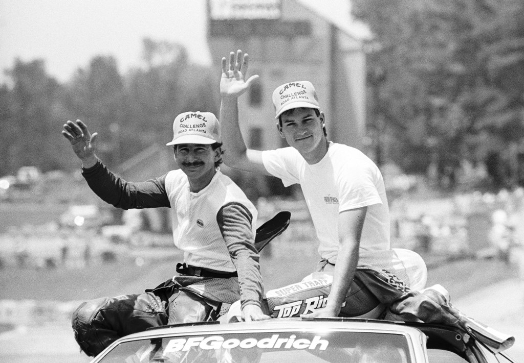 Randy Renfrow and Doug Chandler wave to the fans on their lap of introduction before the start of the Camel Challenge race at Road Atlanta in May of 1988. The Camel Challenge races were an extra money race reserved for the top six Superbike qualifiers. (Larry Lawrence photo)