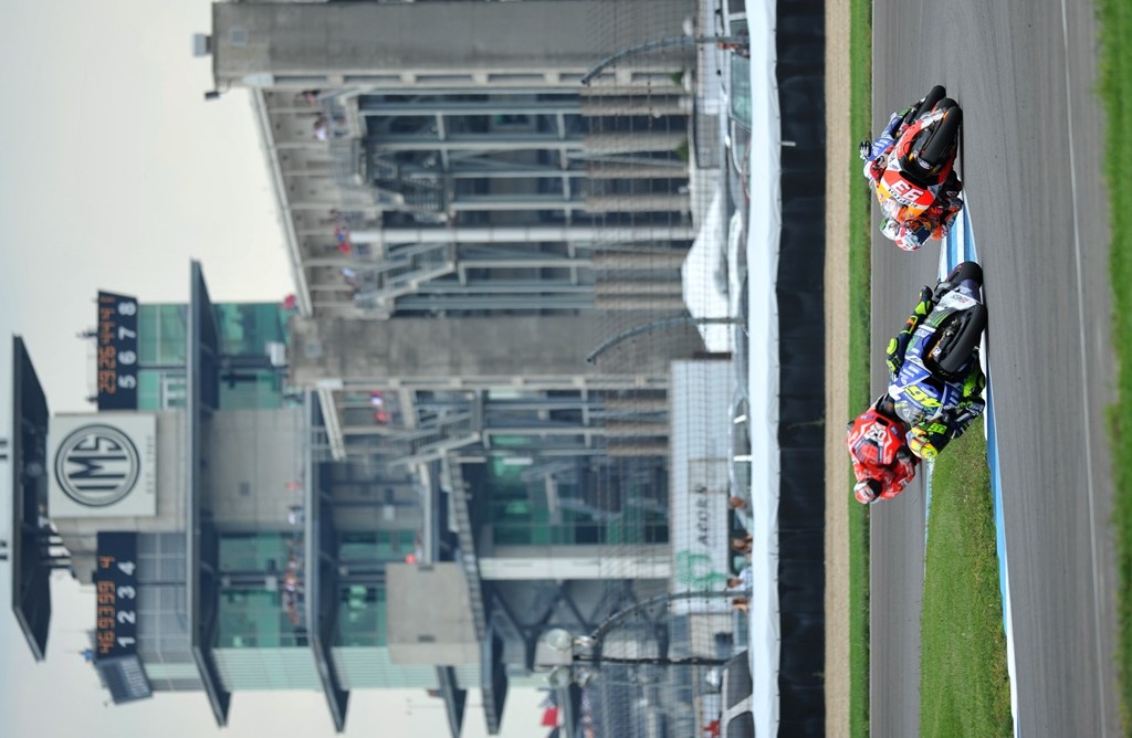 Motorcycle racing icons Valentino Rossi and Marc Marquez race under an iconic tower in the Pagoda at the Indianapolis Motor Speedway during the 2014 Red Bull Indianapolis Grand Prix. This is the fourth version of Indy’s Pagoda since the original wooden Pagoda erected in 1913. (Larry Lawrence photo)
