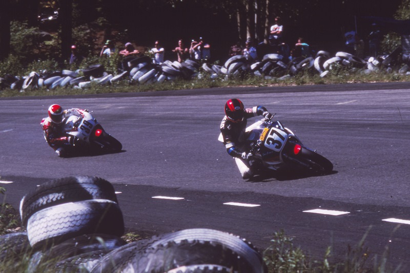 John Ashmead (No. 37) and David Sadowski (No. 39) race their Superbikes through a sea of old tires at the old Bryar Motorsports Park in Loudon, New Hampshire in 1988. These rock hard old tires were what passed as ‘soft barriers’ in those days. (Photo by Henny Ray Abrams)