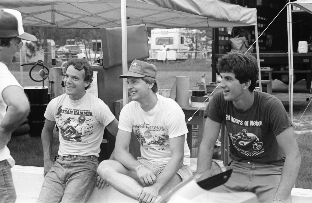 One of the things I enjoyed so much about the WERA National Endurance Series when it was at its peak in the 1980s was the fact that many young up-and-coming racers from different parts of the country would have a chance to go head to head for the first time. This photo illustrates that mix of racers perfectly. Team Hammer’s John Ulrich (standing) talks to (l to r) Pete Carroll, Donnie Rowe and Fritz Kling before a WERA National Endurance race in Sept. of 1986. (Larry Lawrence photo)