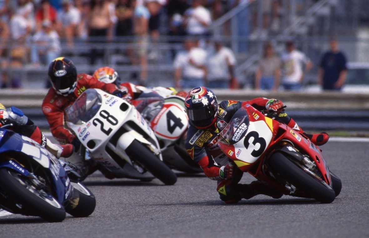 Pole winner Troy Corser (No. 3) has just gotten passed for the lead by Yamaha’s Colin Edwards and runs second in the 1996 Daytona 200. Behind Corser is Canadian Jim Dickenson (No. 28) and Scott Russell (No. 4), who finished runner-up to Miguel Duhamel in the closest finish Daytona 200 finish ever to that point. Corser, who led the race early, dropped out with an overheating Ducati just past mid-race. (Henny Ray Abrams photo)