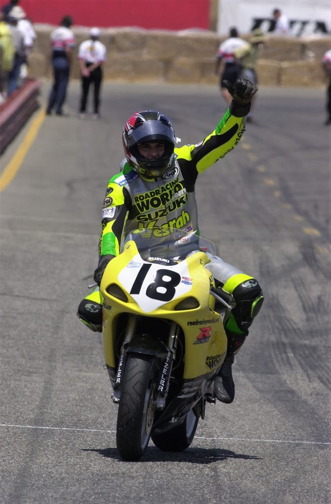 Chris Ulrich celebrates his victory in the AMA 750 Supersport race at Laguna Seca in 2001. Ulrich, who just announced his retirement from full-time pro racing, left a lasting legacy in the sport during his racing days through his constant efforts to promote road racing. (Henny Abrams photo)
